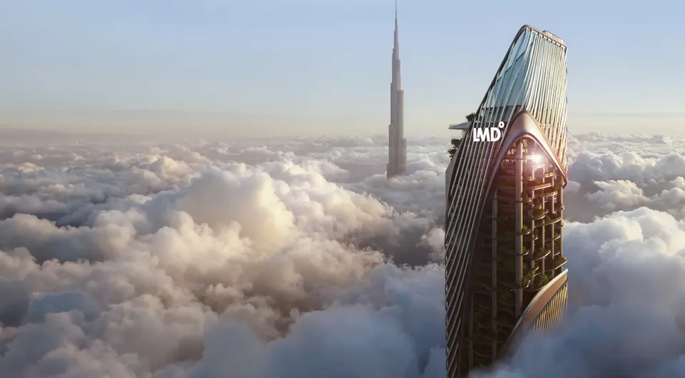 Christian A. Rockefeller Business Tower rising above a sea of clouds, with the Burj Khalifa behind it